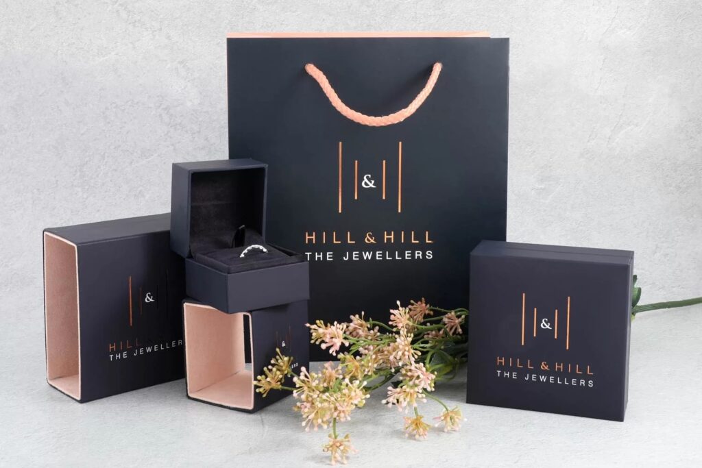 Luxury jewelry boxes and a gift bag
